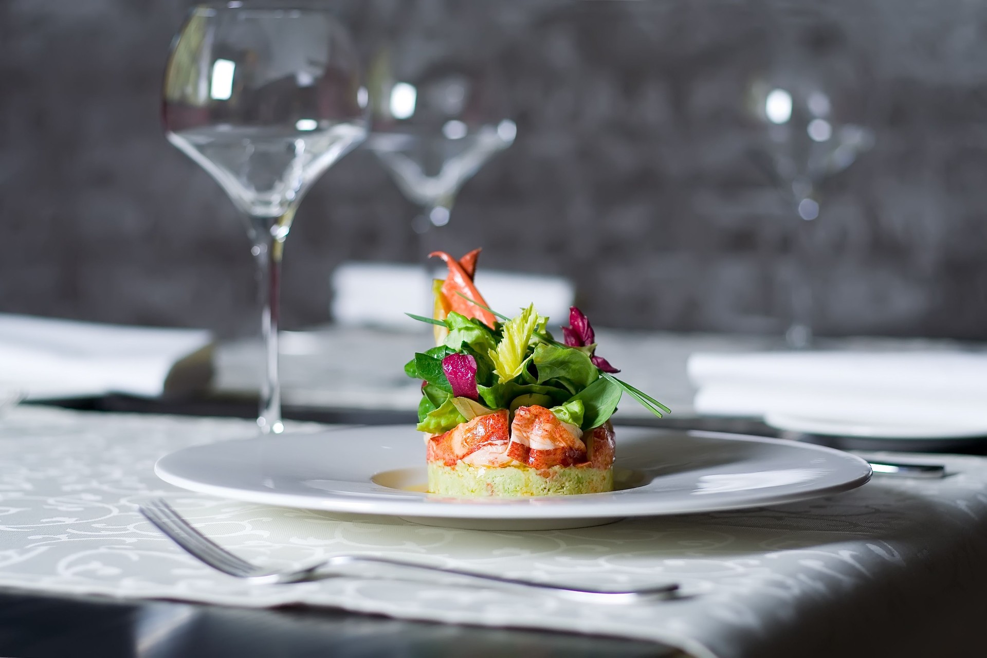 Crab meat appetizer, seafood delicacy in restaurant interior